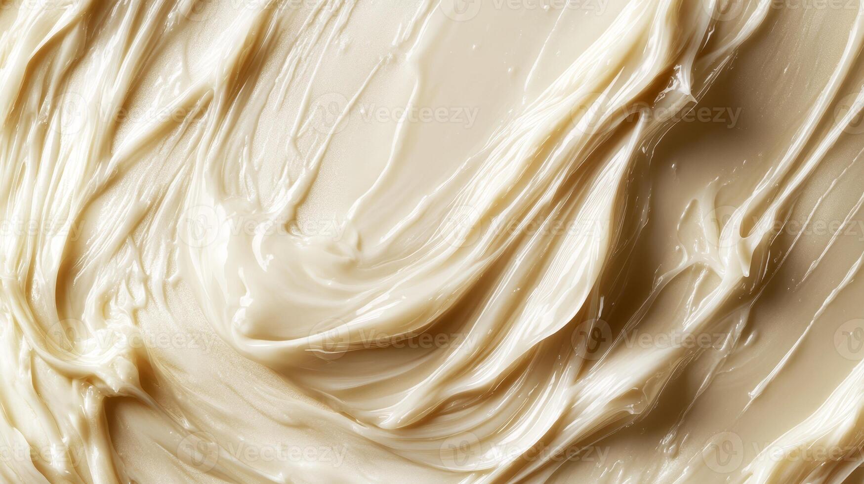The surface displays a smooth, shiny, and creamy substance that suggests moisture and richness, ideal for enhancing various dishes photo