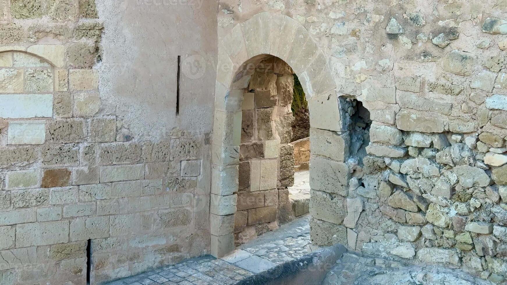 Explore this stunning ancient archway, showcasing beautiful historical stonework and remarkable architecture photo