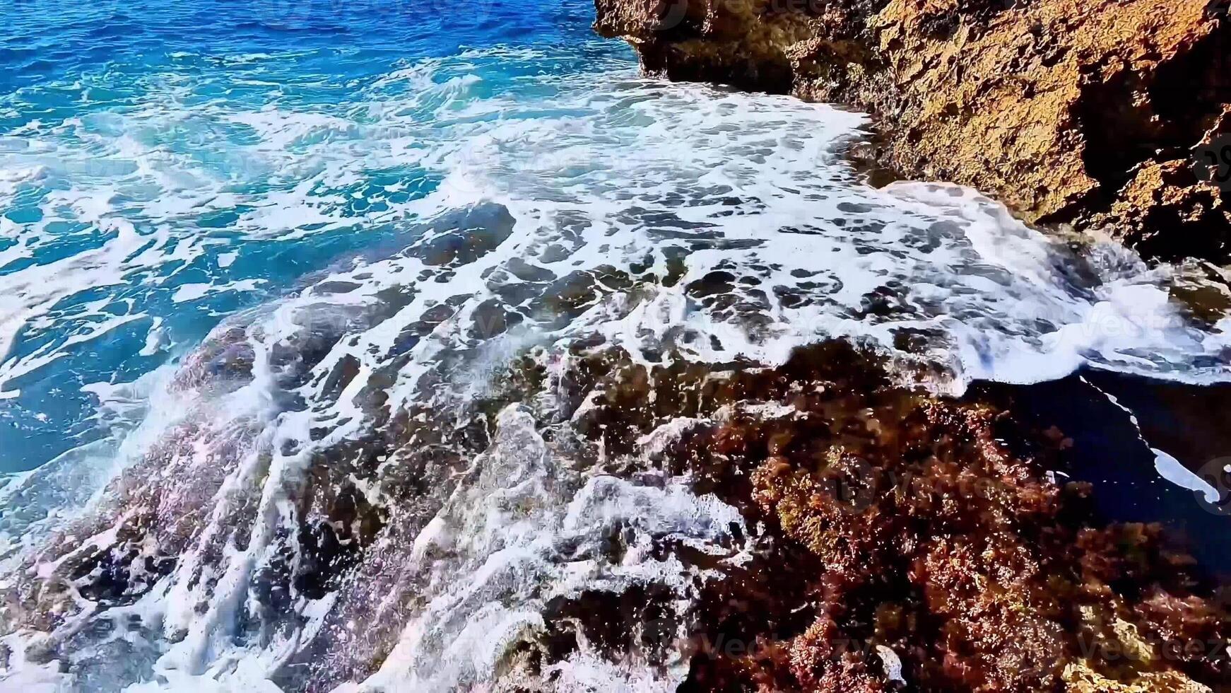 Stunning ocean waves majestically crashing against rugged rocky coastlines, showcasing the inherent beauty of nature photo