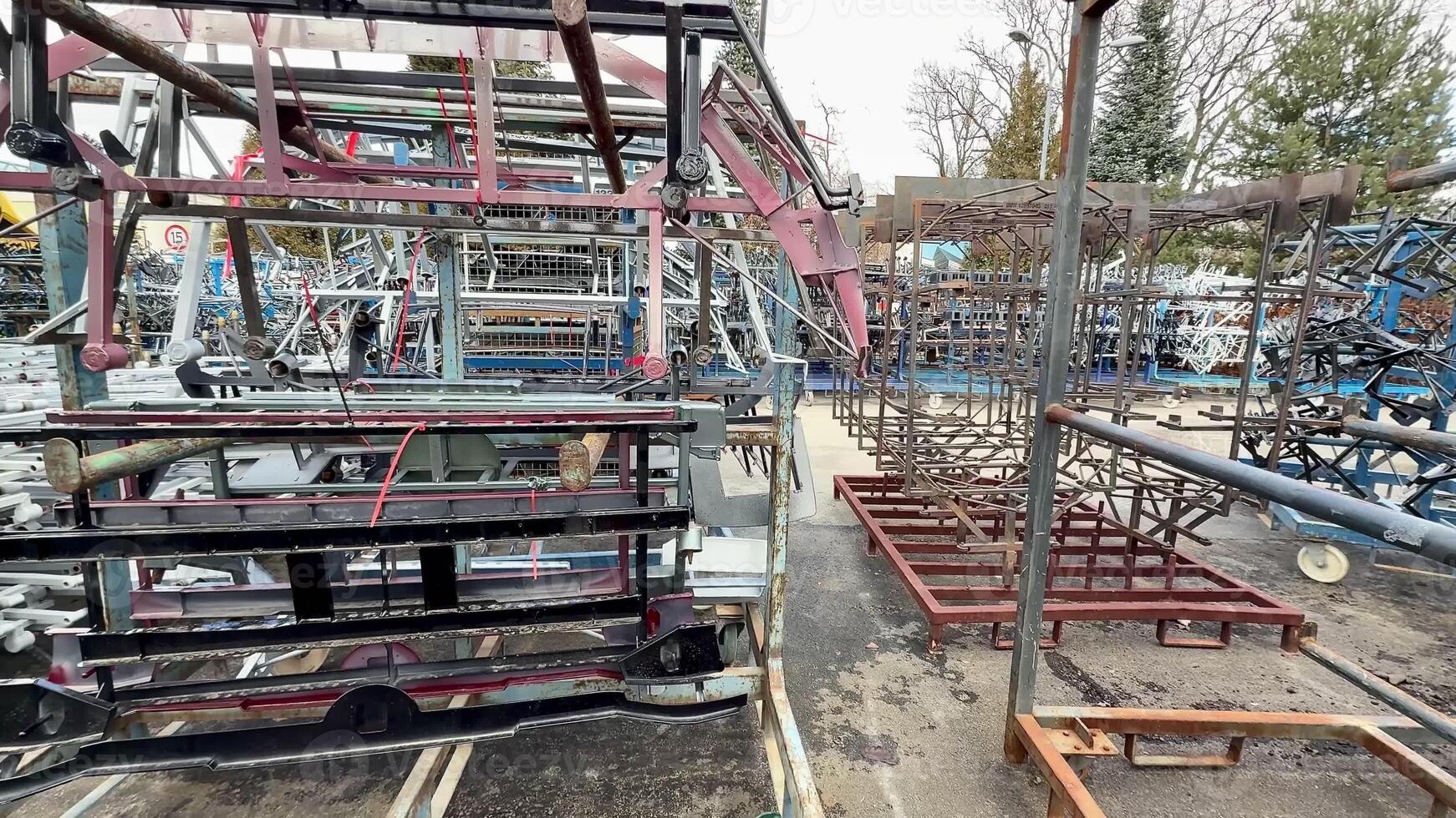 A panoramic view showcasing the stacked metal storage racks located in an expansive outdoor industrial area photo