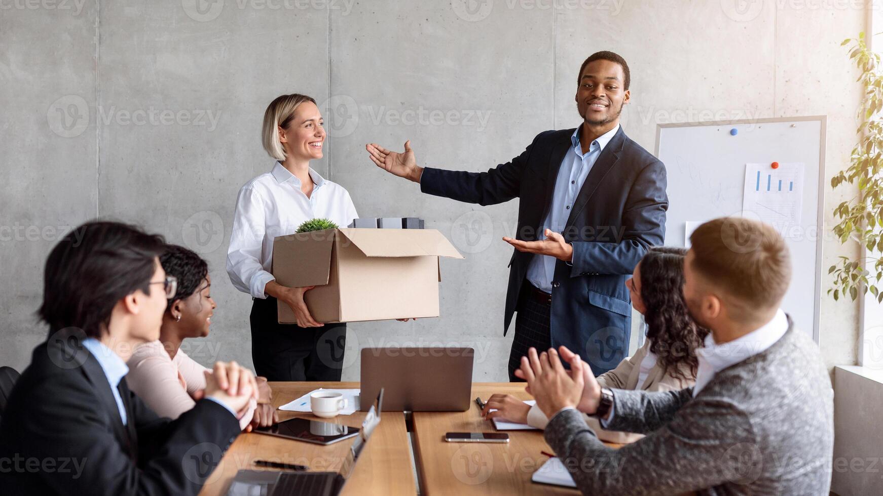 Businessman Introducing New Business Team Member To Employees Coworkers And Colleagues During Corporate Meeting In Modern Office. Career Growth, New Job And Employment Concept. Selective Focus photo