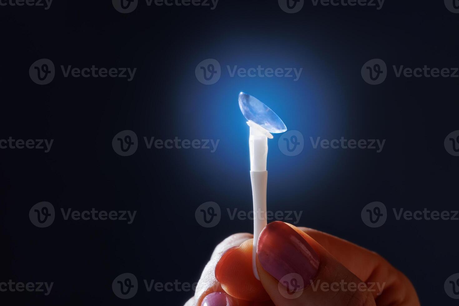 Macro Contact Lens on Applicator for Vision Correction, Better Eyesight and Glasses Replacement photo