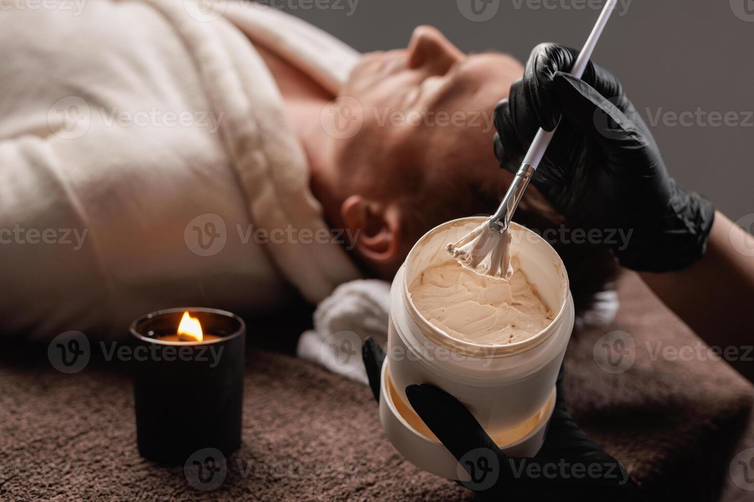 Rejuvenating Moisturizing Face Mask Application, Professional Facial Skincare Treatment for Men photo
