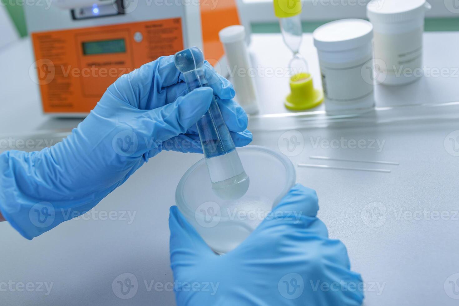 Lab Technician Mixing Chemical Compound with Mortar and Pestle for Pharmaceutical or Chemistry Research photo