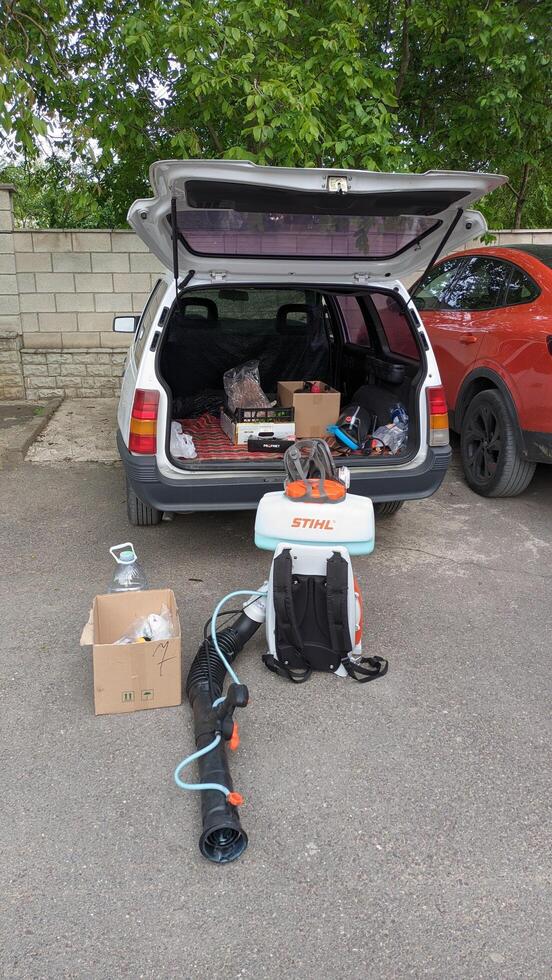 10.05.2025 Moldova Utility Vehicle Equipped with Necessary Equipment in an Outdoor Setting for Various Tasks photo