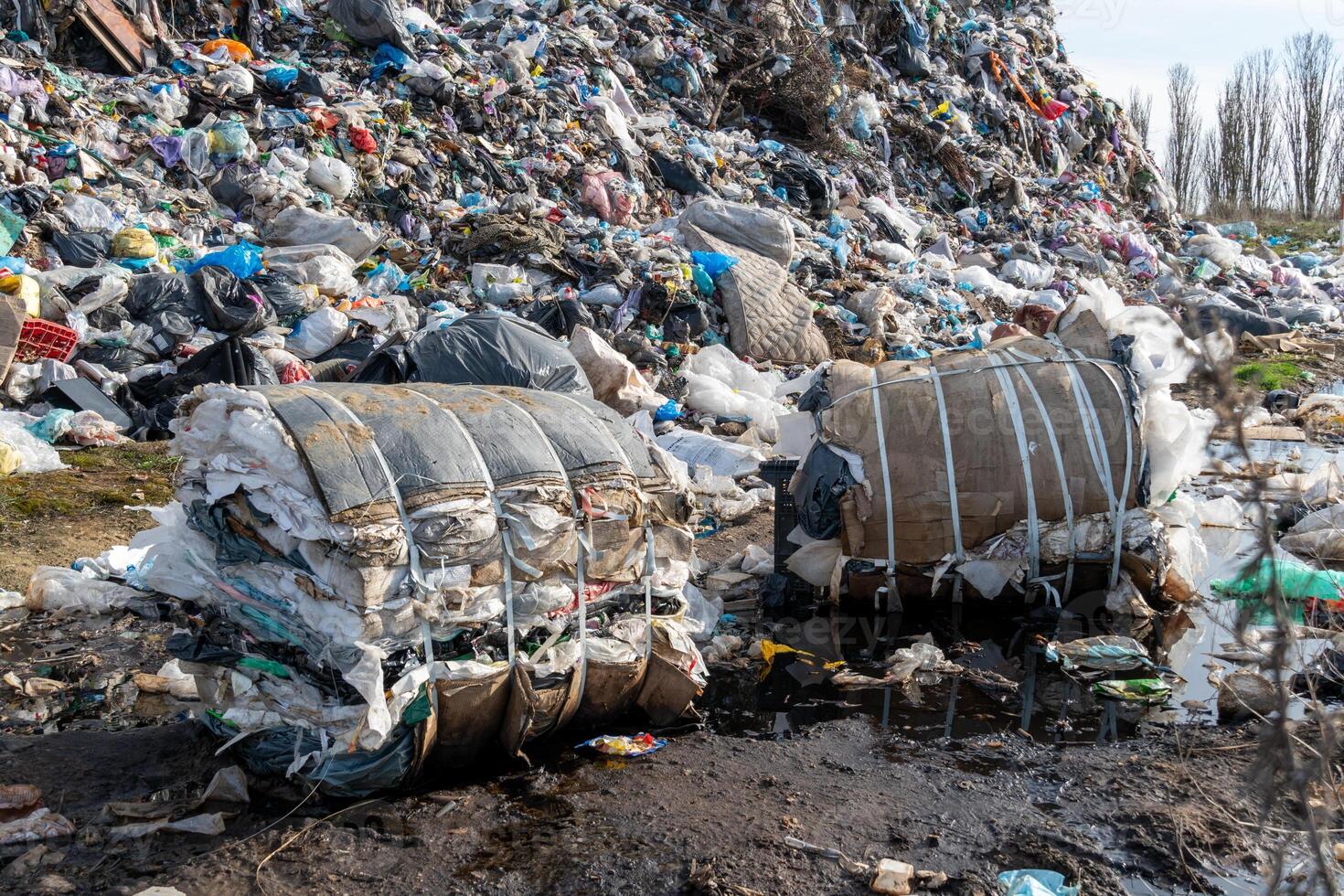 Immense Landfill Accumulation with Baled Waste Material and General Trash photo