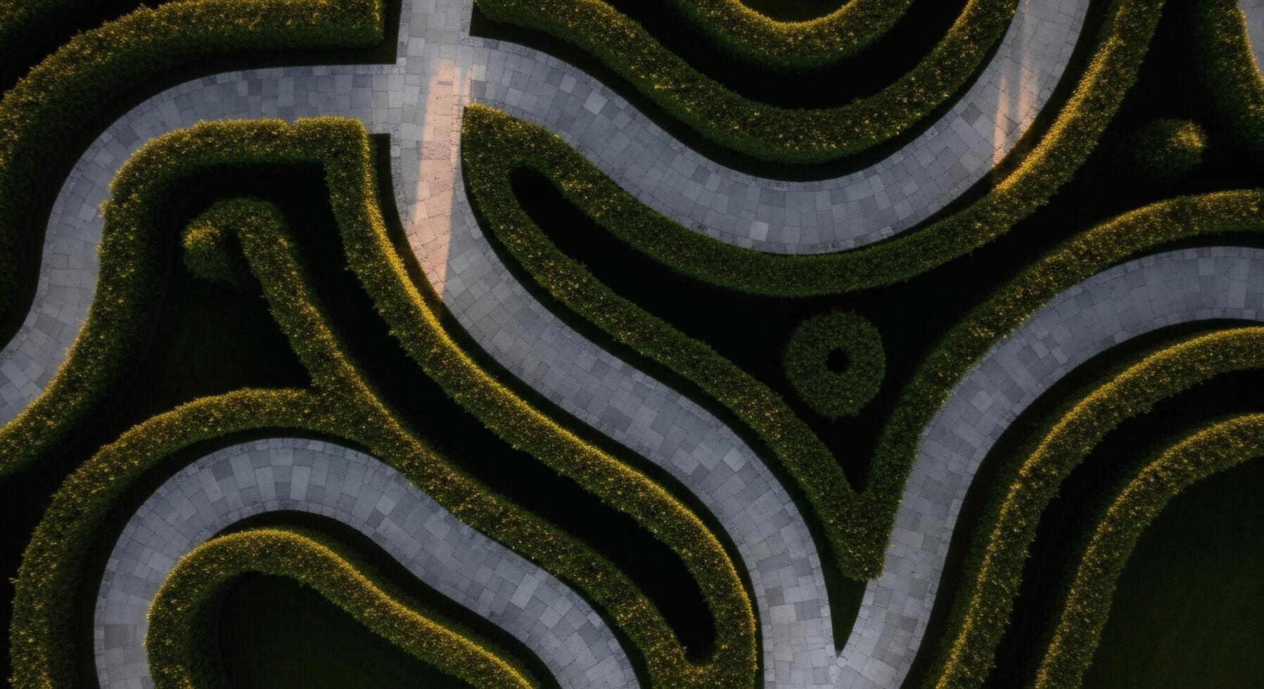 An aerial view of a winding road in a park photo