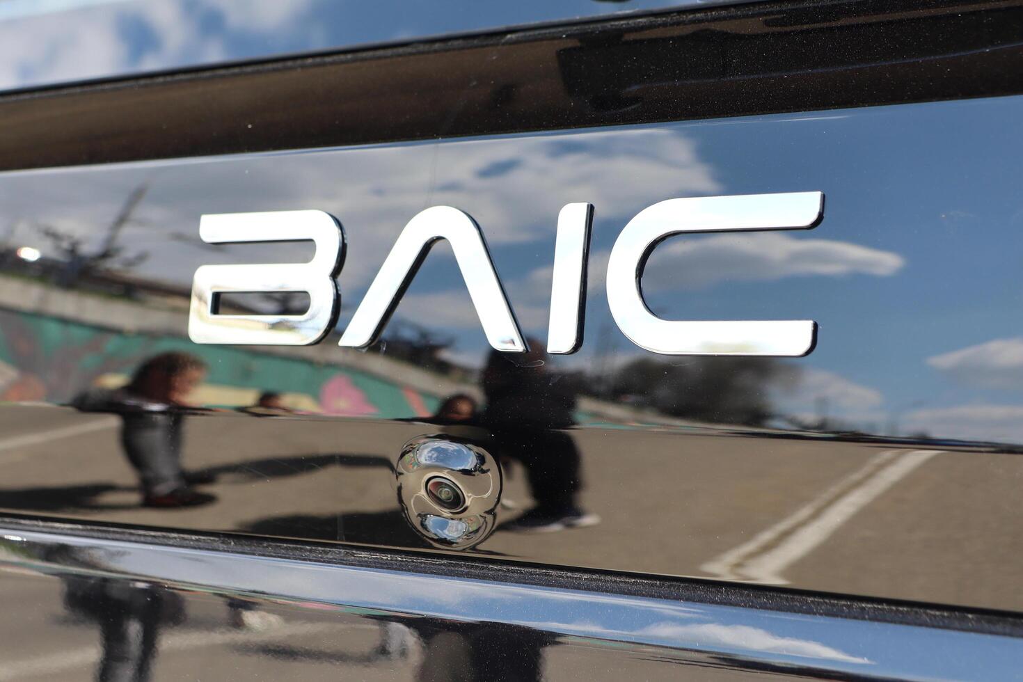 09.3.2025 Moldova The Reflective Logo of BAIC Car on a Polished Automotive Surface Exhibits Modern Aesthetics photo