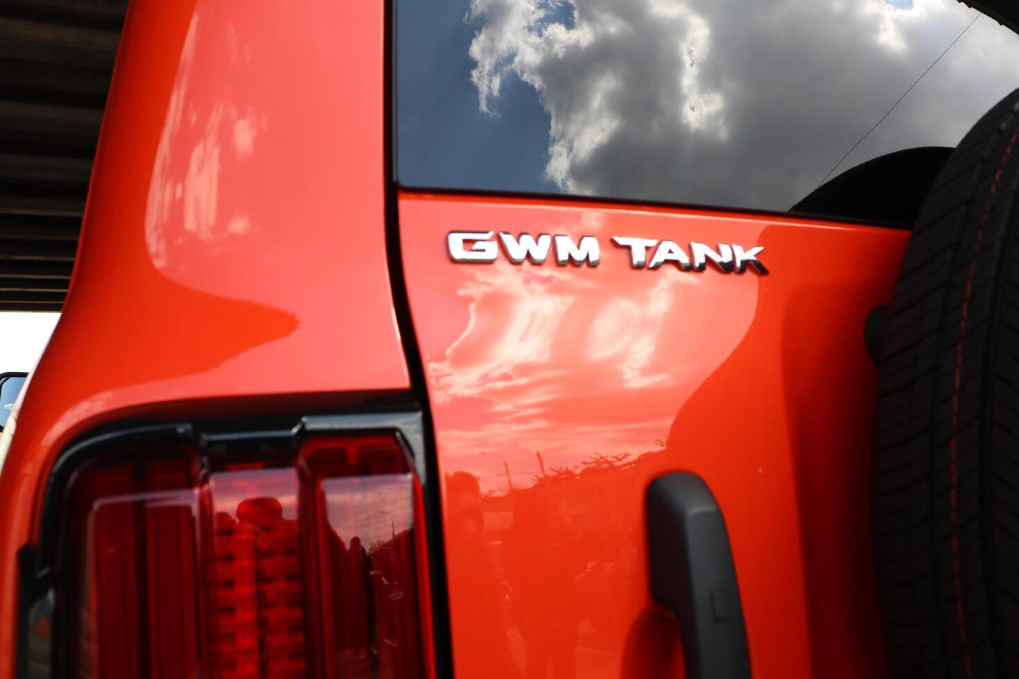 09.3.2025 Moldova GWM Tank A Bold and Colorful Compact SUV Enthusiastically Styled in Vibrant Orange Shade photo