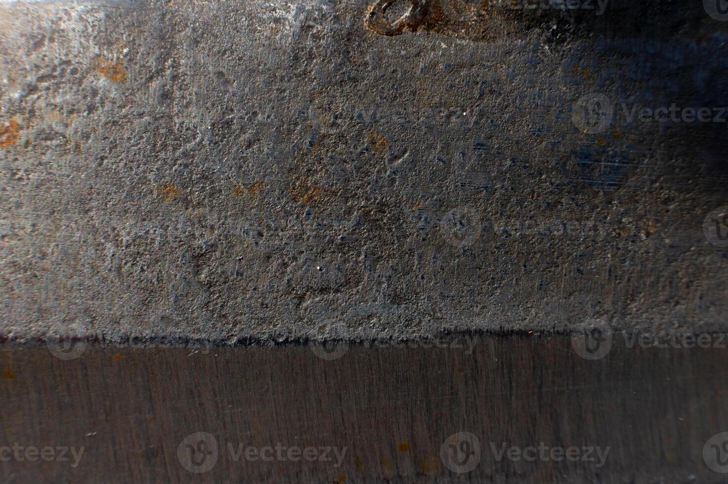 Rusty metal texture for background. Macro shot of stainless steel knife opening with rust photo