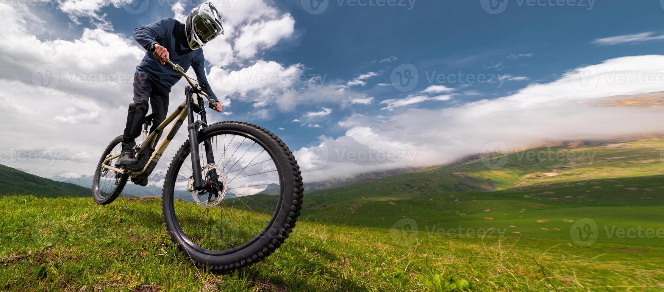 MTB Mountain Bike cyclist riding single track wide angle photo