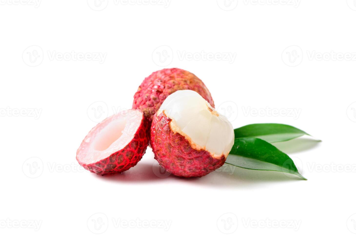 Juicy Lychee with cut in half and leaves isolated on white background. photo