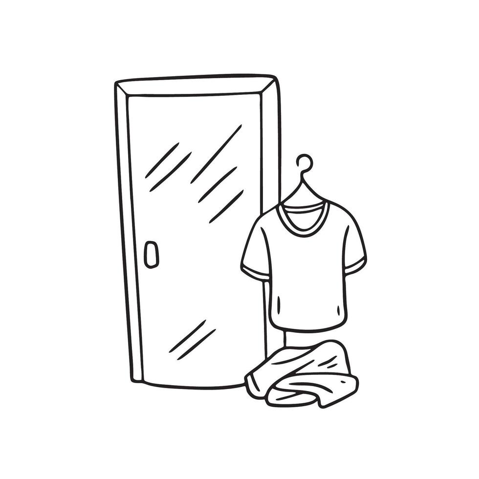 A crumpled undershirt lying close to the bathroom door vector