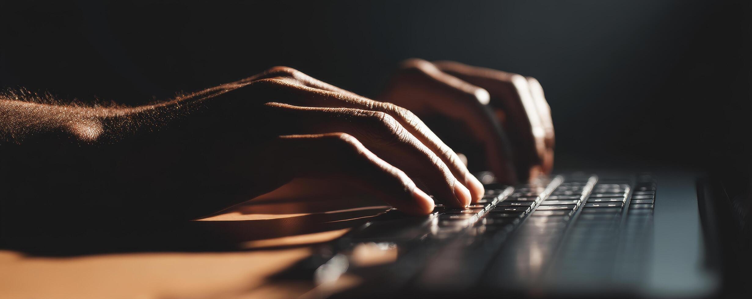 Hands typing on sleek keyboard in dark room tech reflection photo