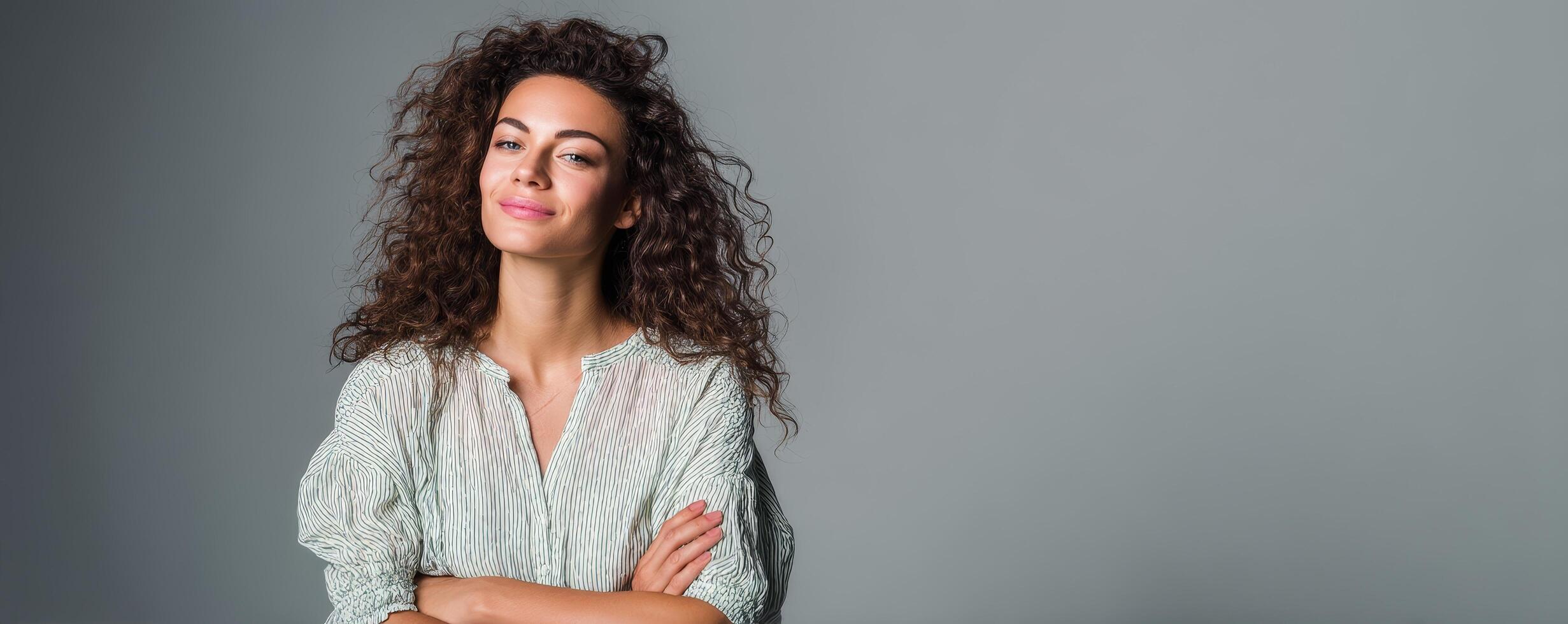 Confident woman smiling in studio portrait happy expression close-up photo