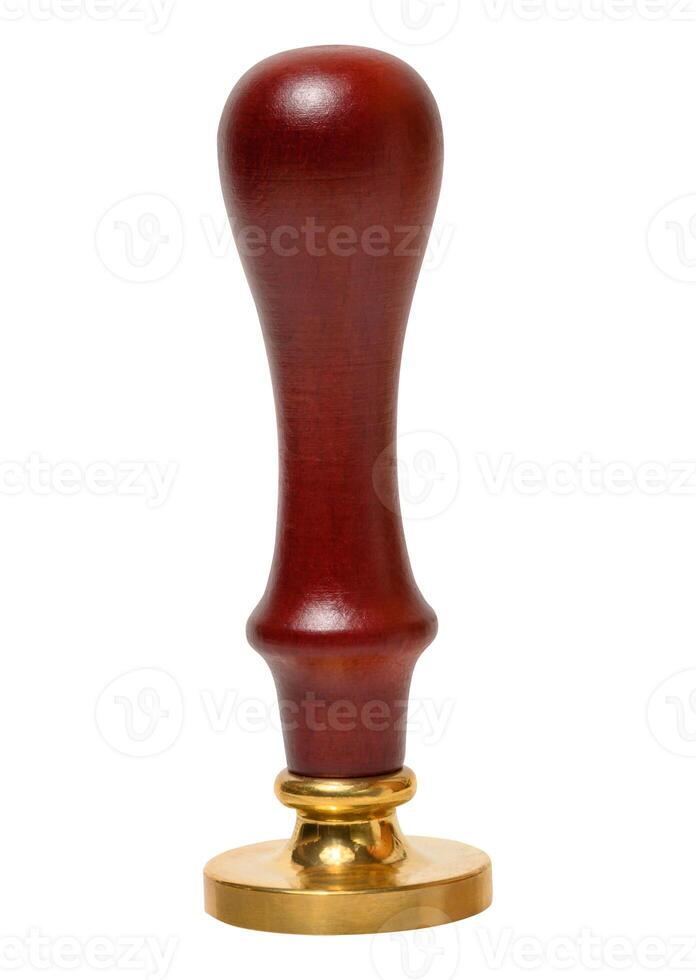 Wax seal with wooden handle and brass stamp on isolated background. photo