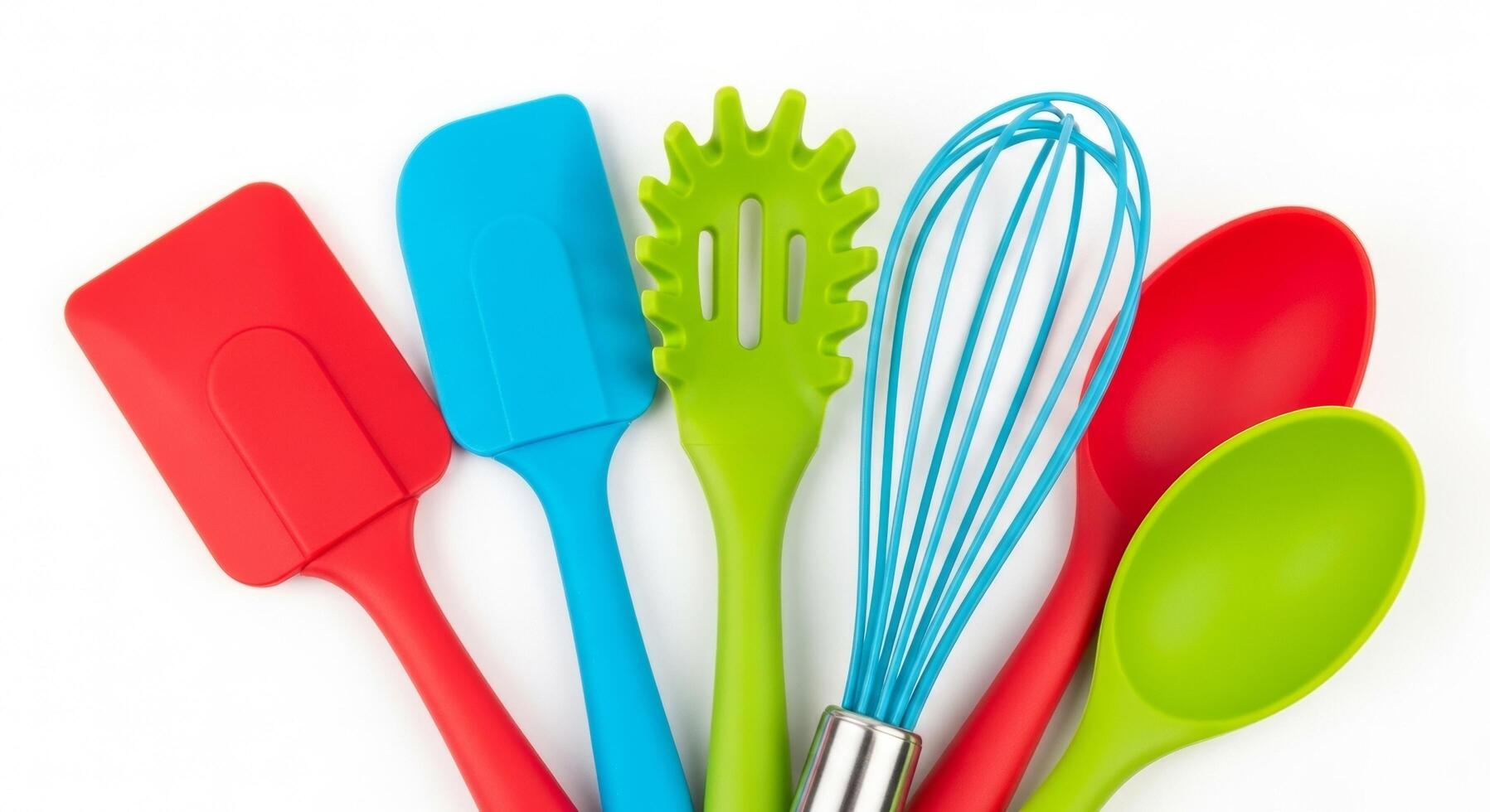 Colorful Kitchen Utensils Spatulas, Spaghetti Server, Whisk, and Spoons on White photo