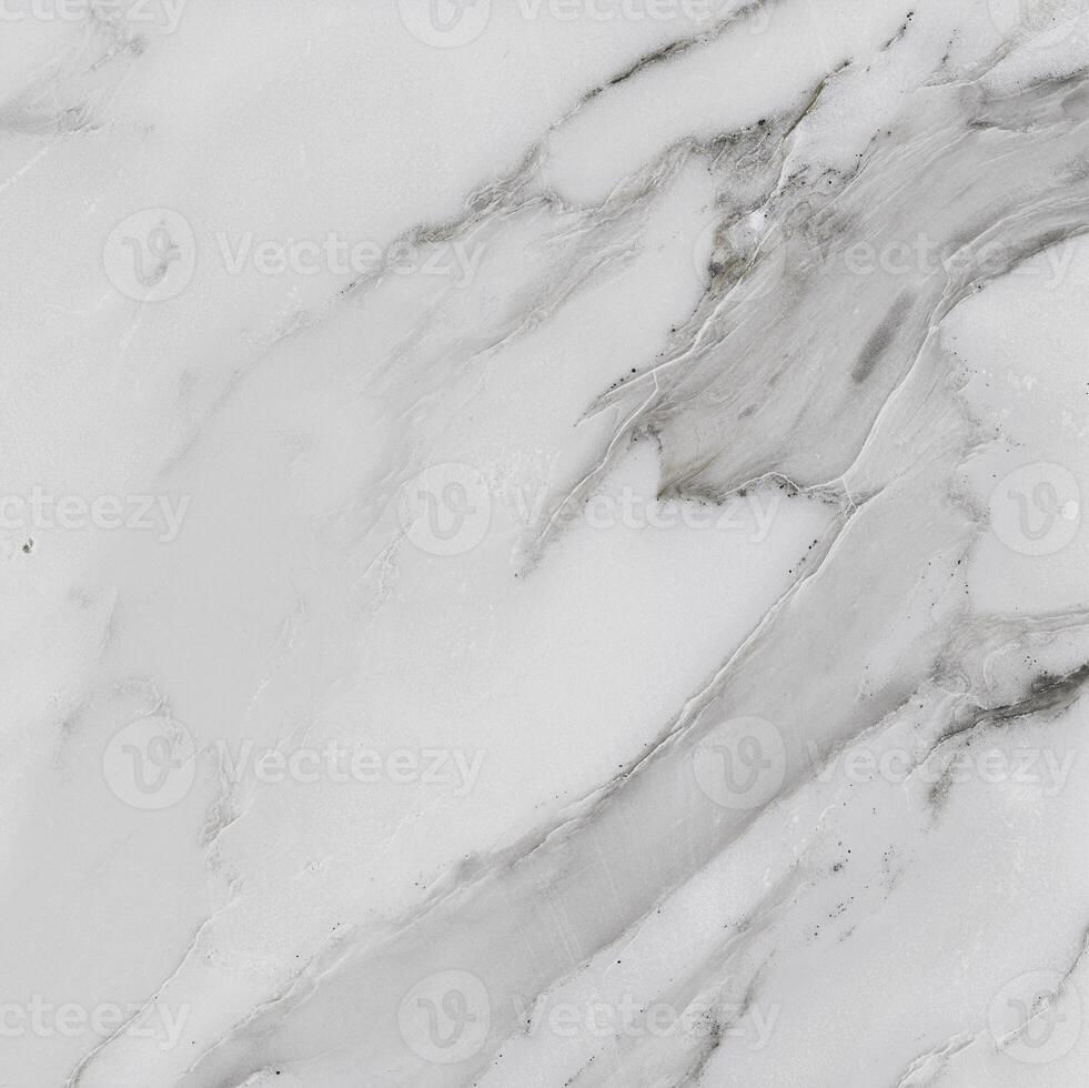 a white marble surface with a black and white pattern photo