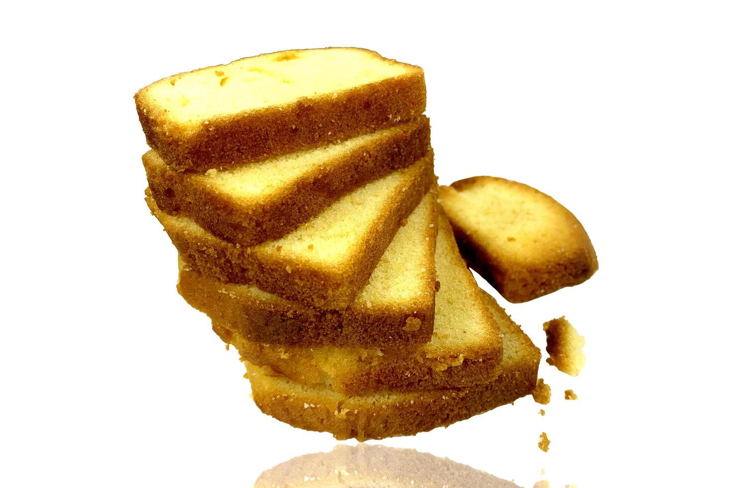Tasty and yummy yellow sweet cakes artistically arranged in tower style looking so delicious photo