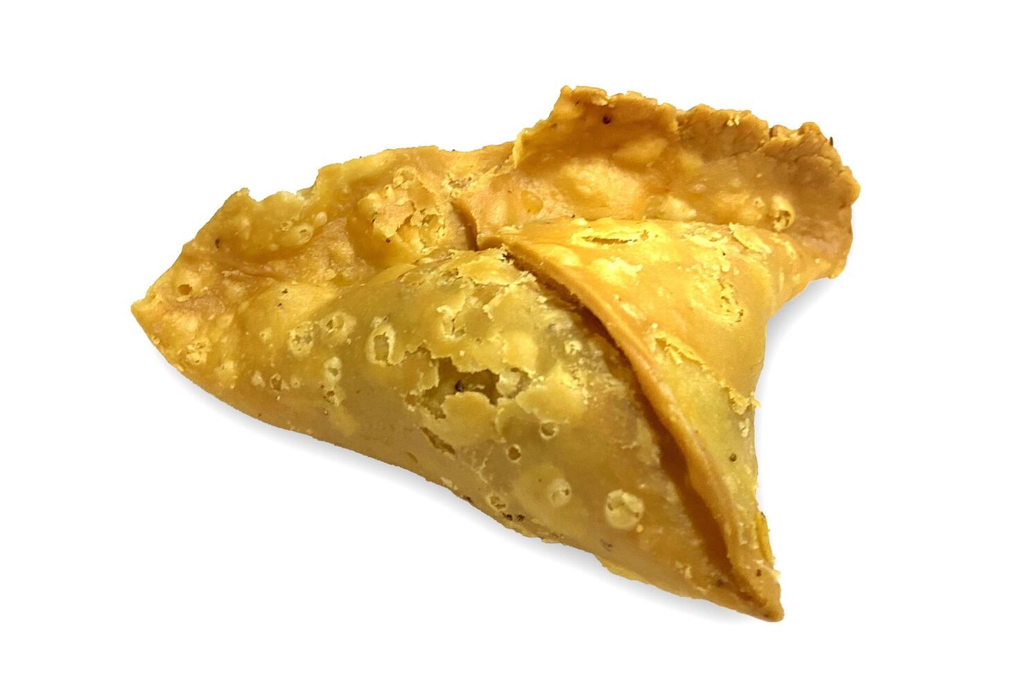 Tasty and crispy samosa isolated on the white background photo