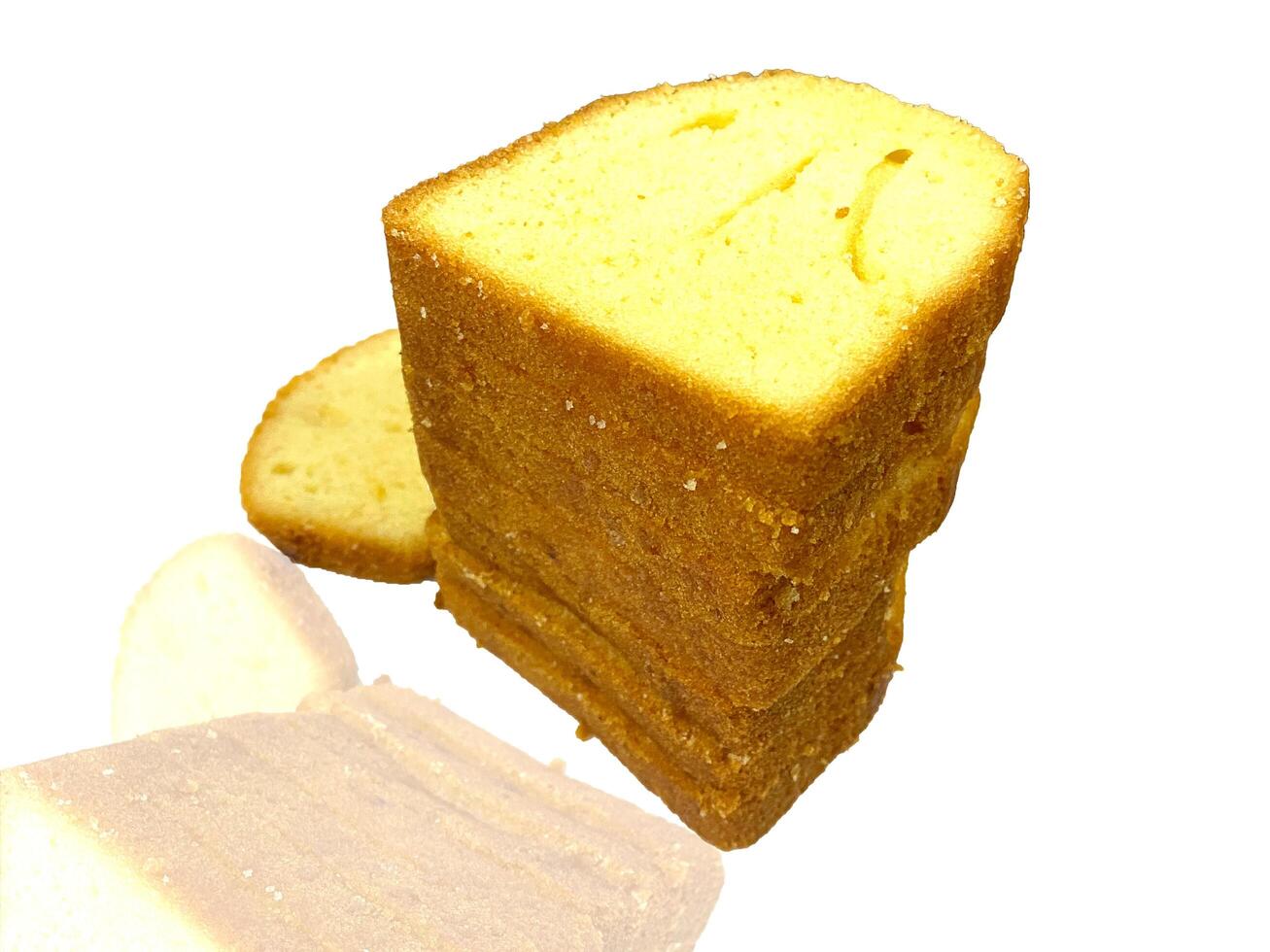 Sweet tasty cakes nicely arranged on the white background photo
