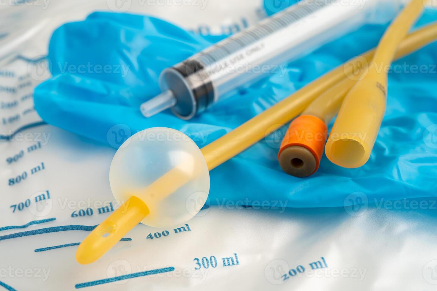 Foley catheter urine drainage bag collect urine photo