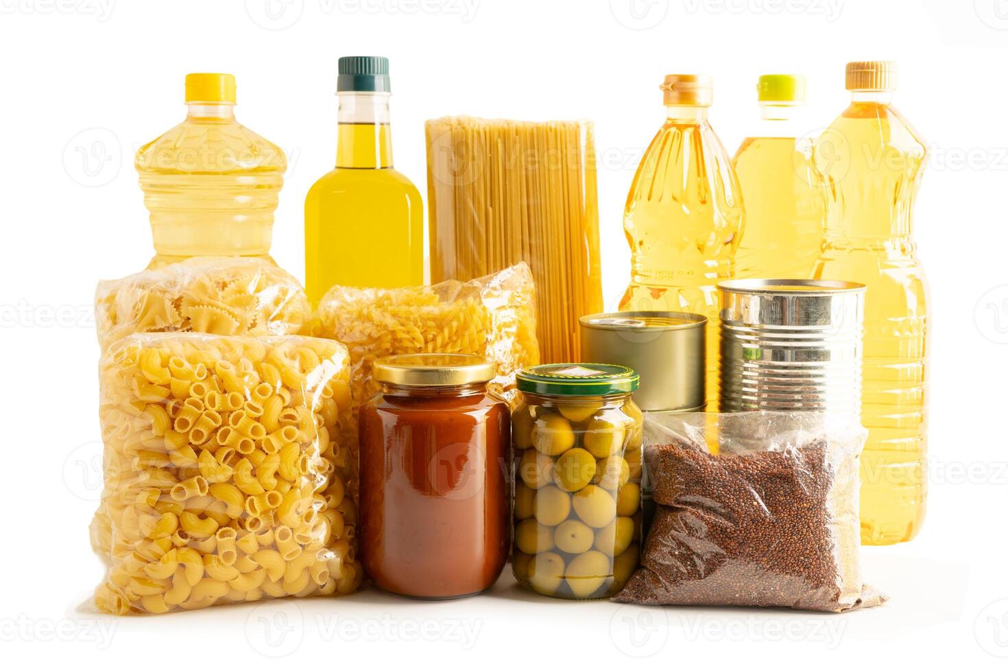 Foodstuffs in donation box isolated on white background for volunteer to help people. photo