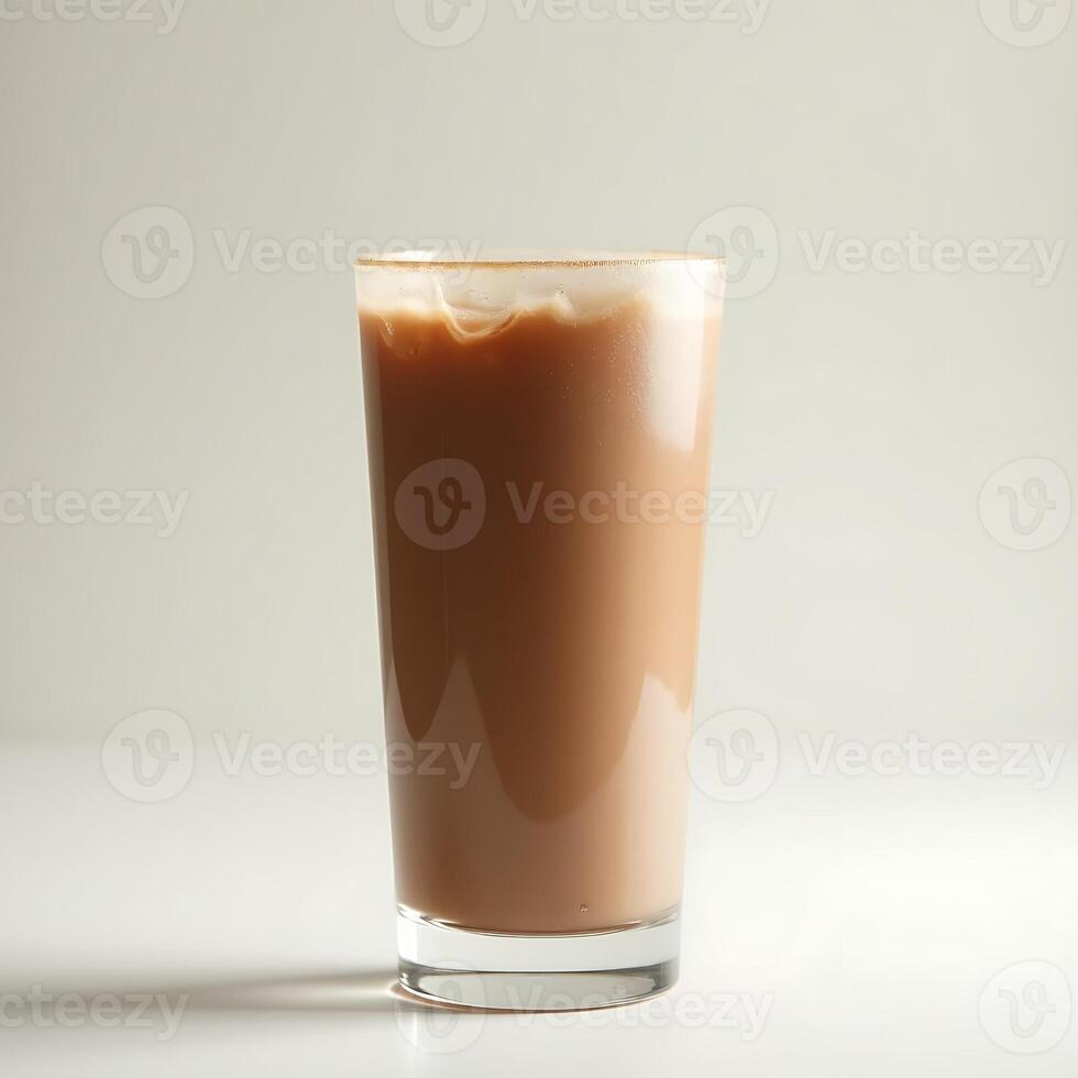 Serving of Chocolate Milk in a Glass on White Background photo