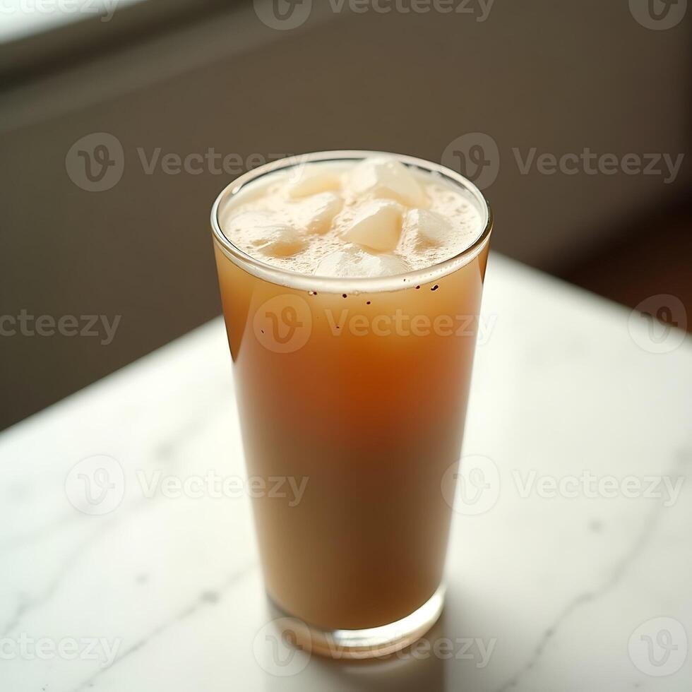 Iced Drink Refreshment in Glass on Marble Surface photo