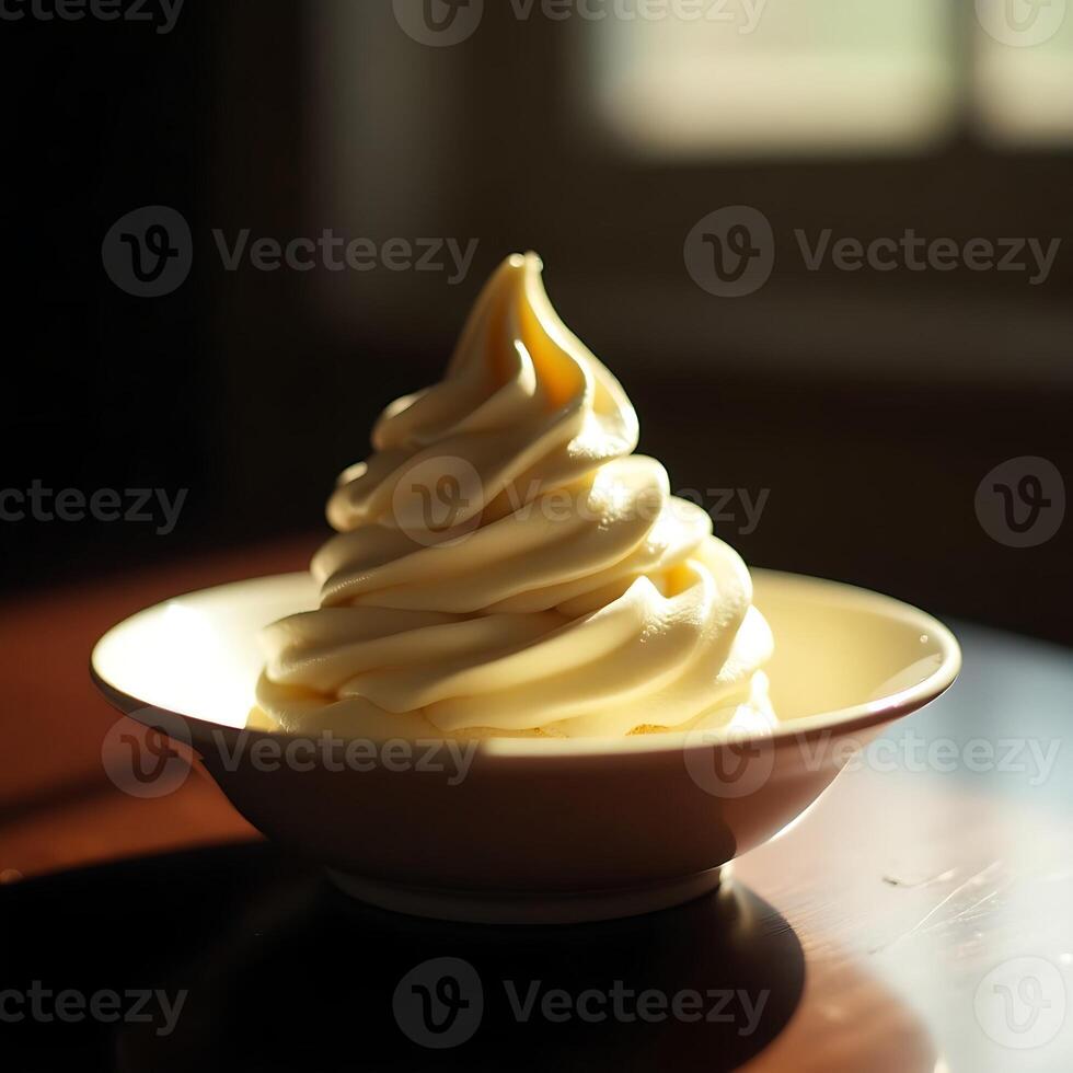 Serving of Soft Serve Ice Cream in a Bowl in Natural Light photo