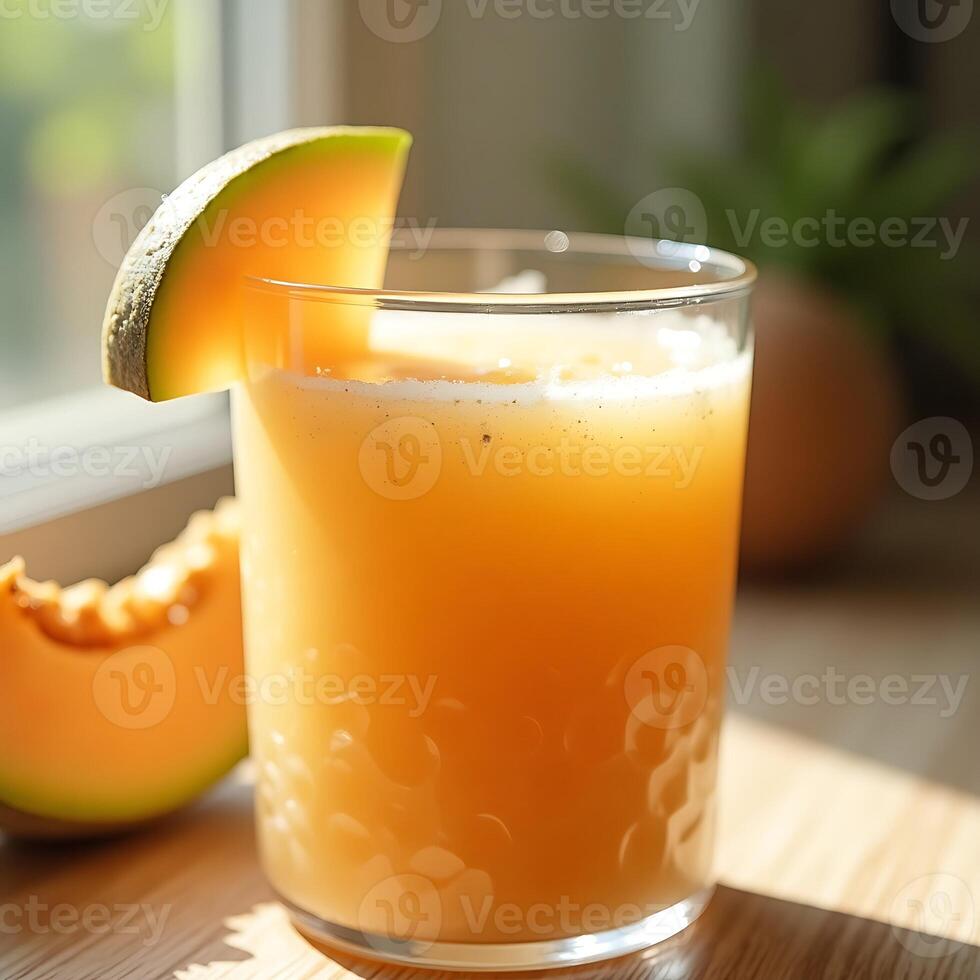 Serving Fresh Melon Juice in Glass with Slice photo