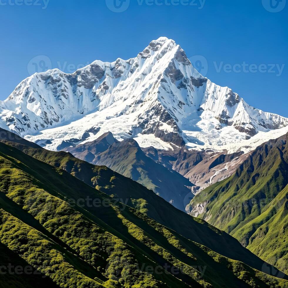 A mountain with snow capped peaks in the background photo