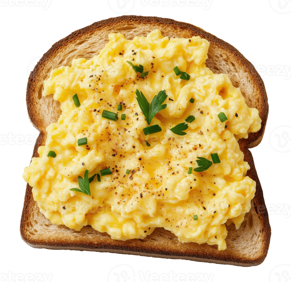 Scrambled eggs with herbs served on toasted bread slice isolated on transparent background png