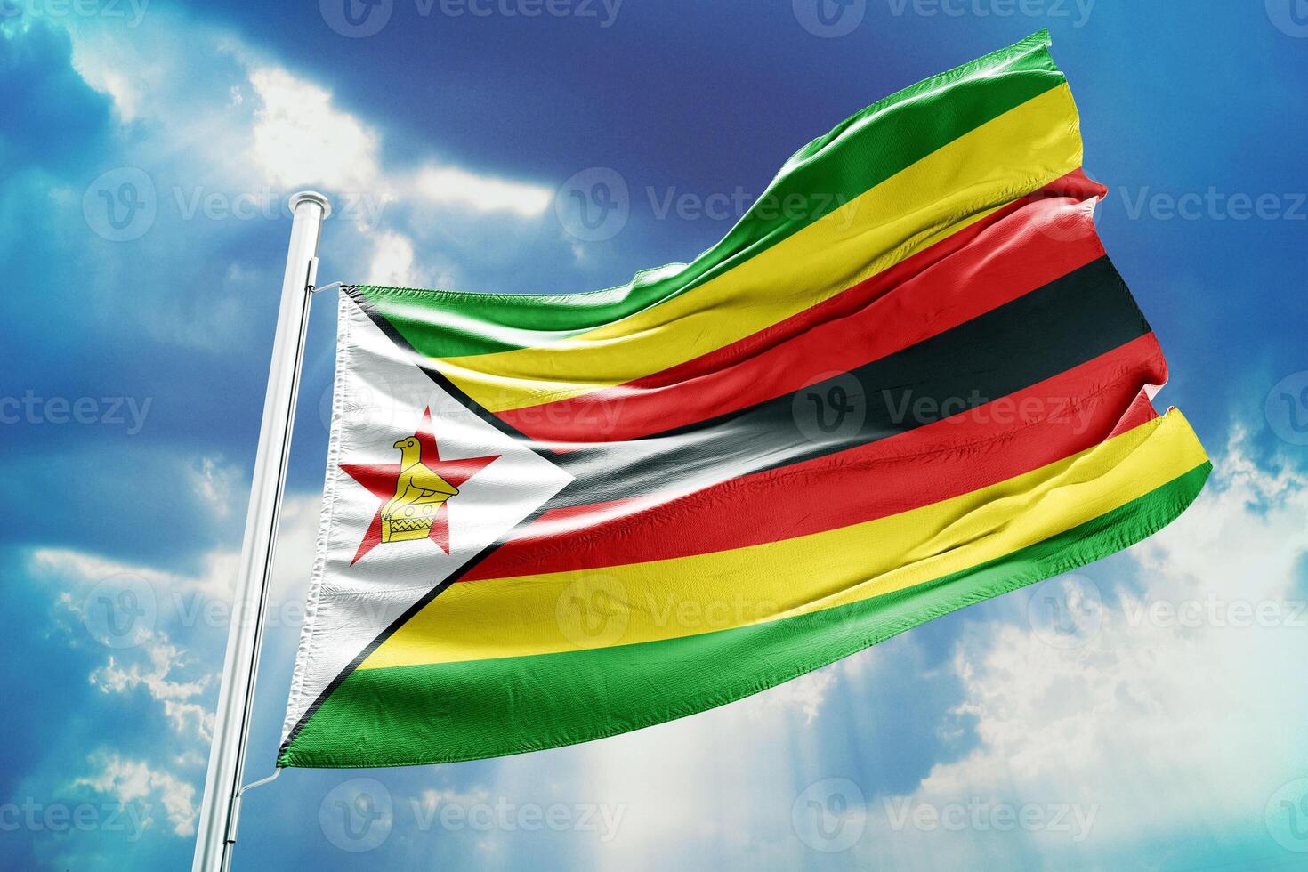 Zimbabwean flag on a blue sky background photo