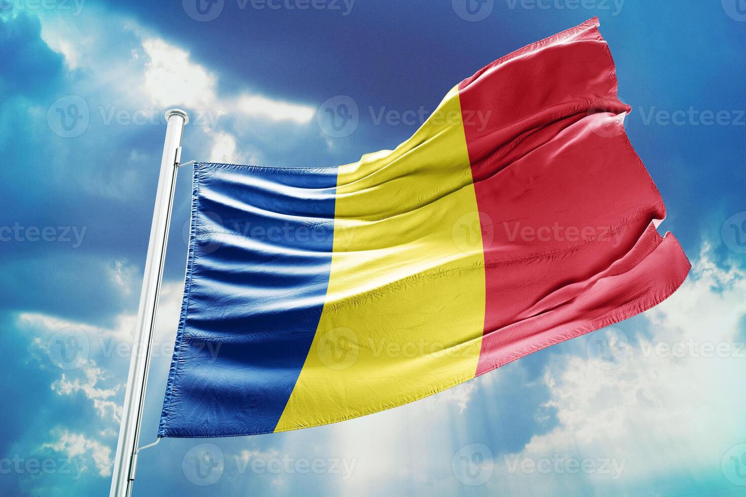 The flag of romania is flying high in the sky photo
