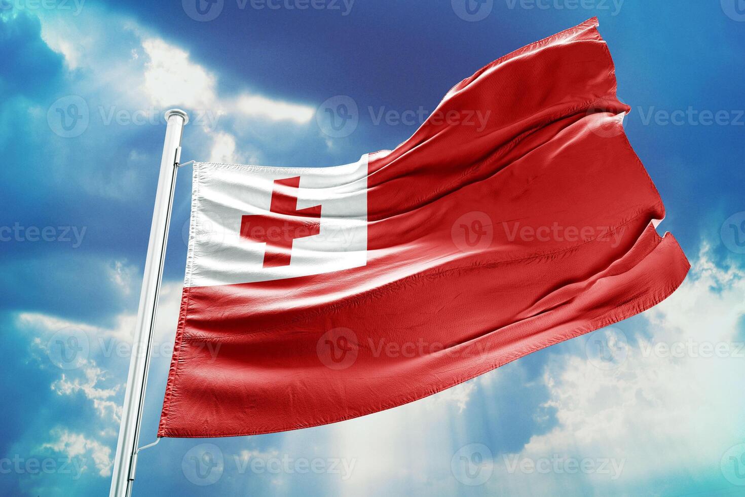 A red and white flag flying in the wind photo