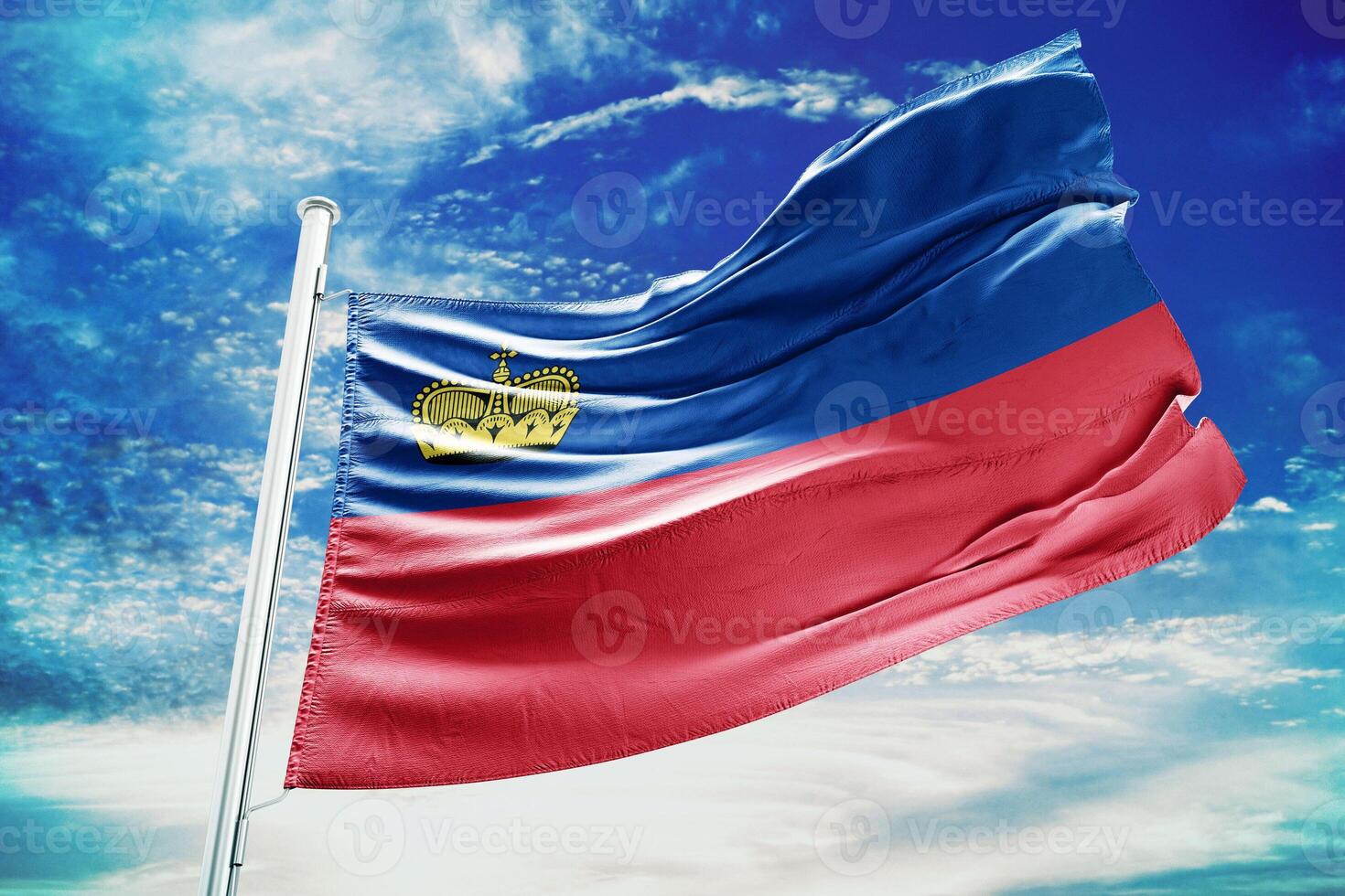The flag of the country of laos is flying in the sky photo