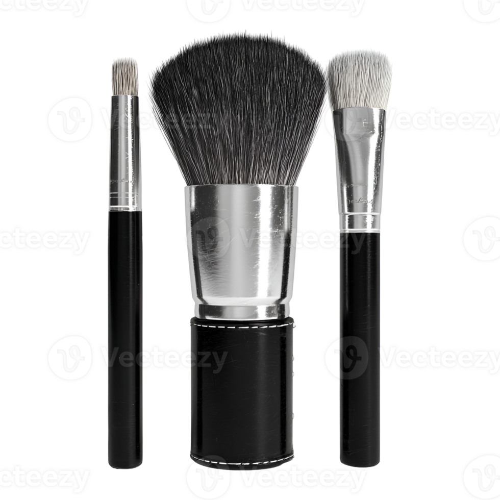 Three black makeup brushes a large powder brush and two smaller brushes png