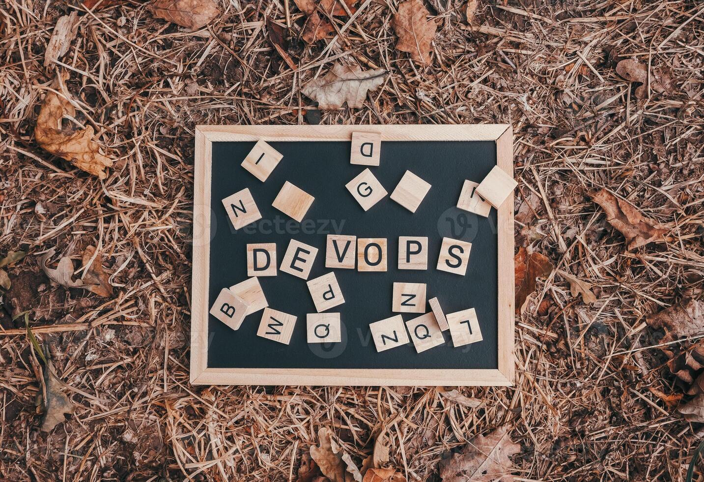 Blackboard with DevOps written on it photo