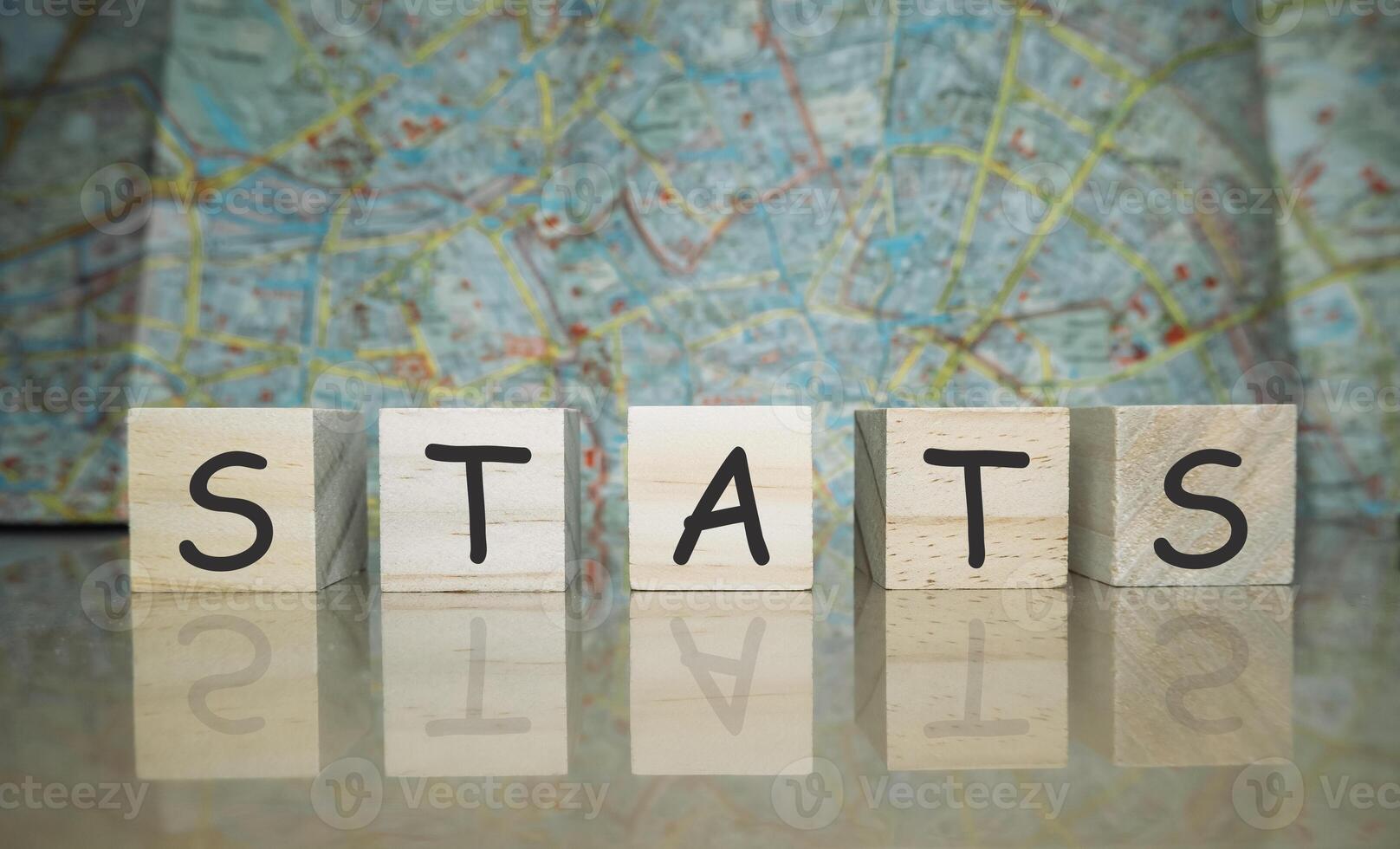 Wooden block with the word stats written on it photo