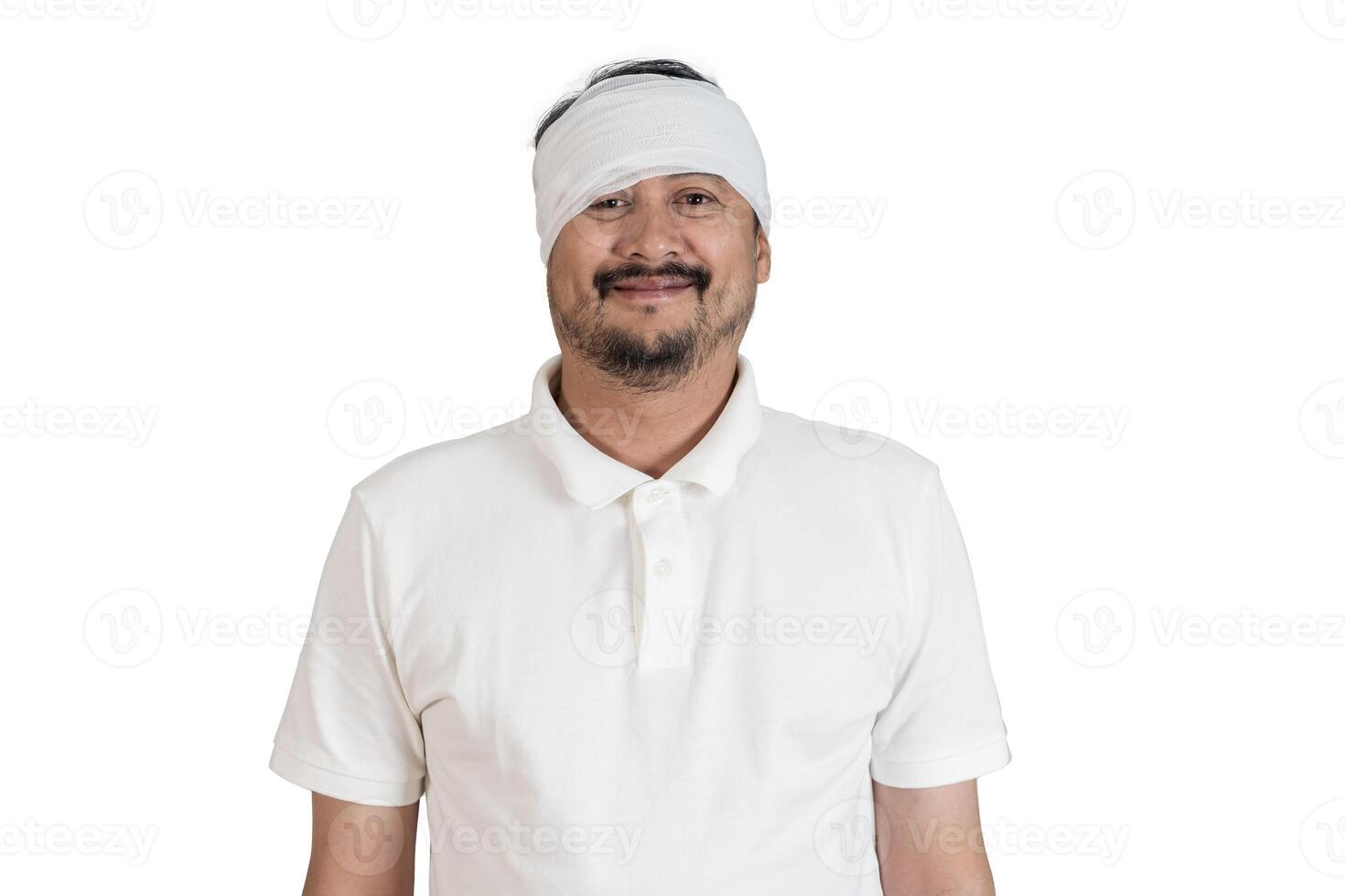 Portrait of smiling injured man with head bandage in white shirt on white background showing recovery concept photo