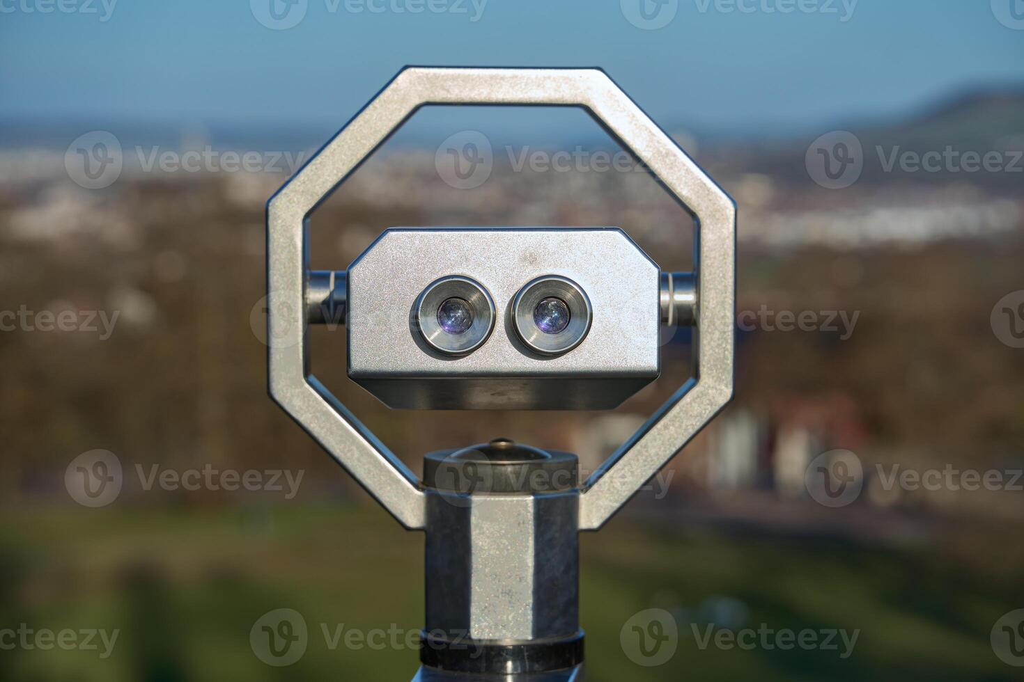 Sightseeing tower viewer, observation binoculars. Binoculars on the observation deck with panoramic views of the city. photo