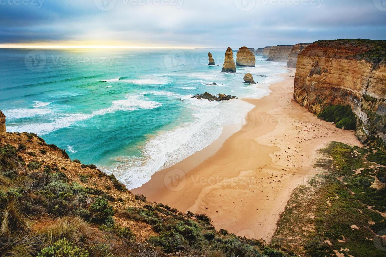 A scenic view of the twelve apostles rock formations along the great ocean road coastline australia photo