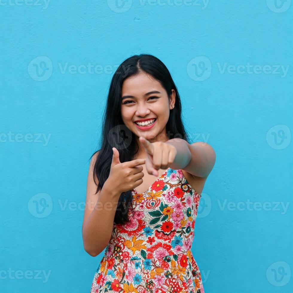 An Engaging Portrait with an Inviting and Playful Gesture photo