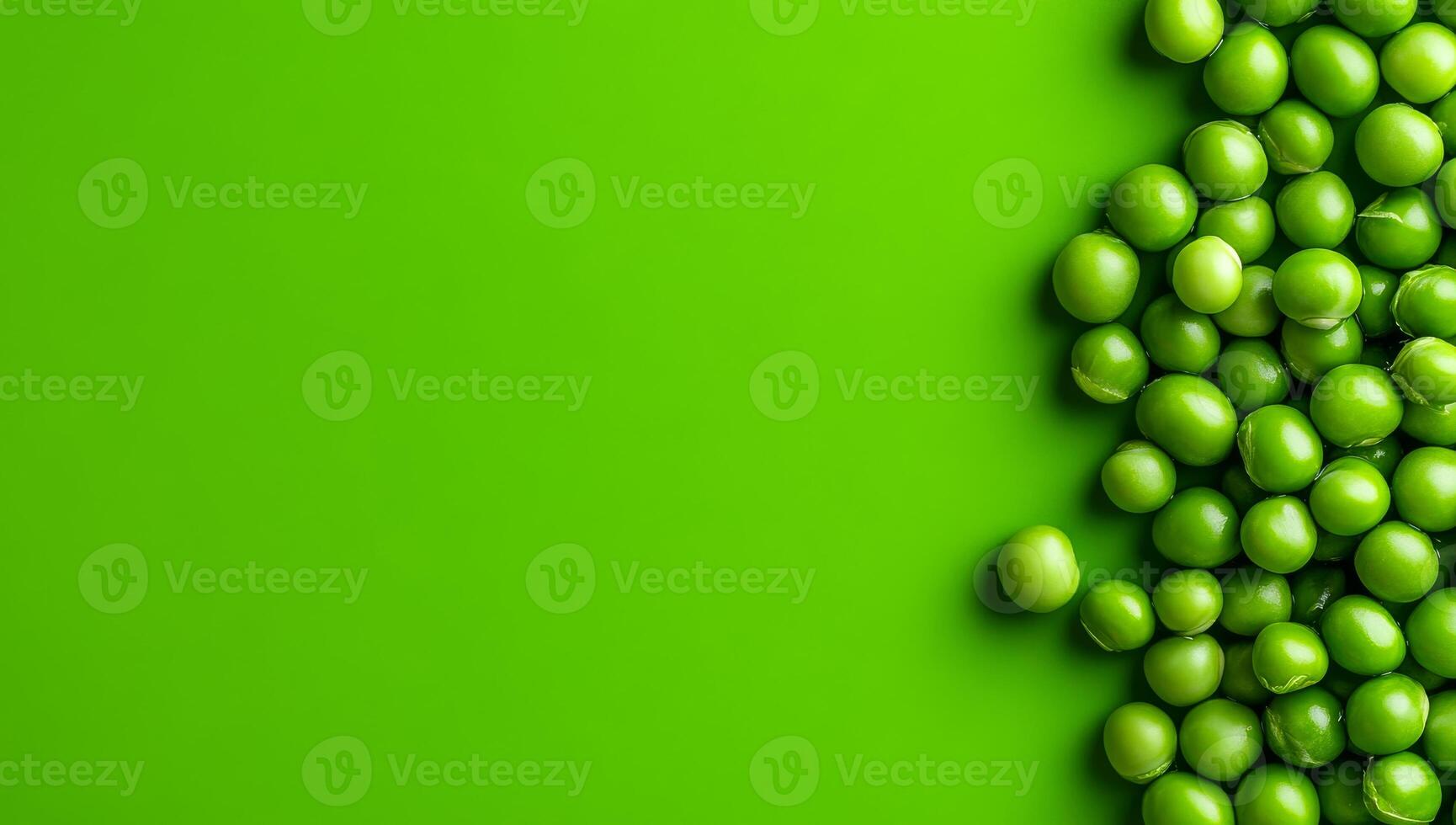 Fresh green peas on a vibrant surface. Bright green peas scattered on a vivid green background, showcasing freshness and natural color. photo
