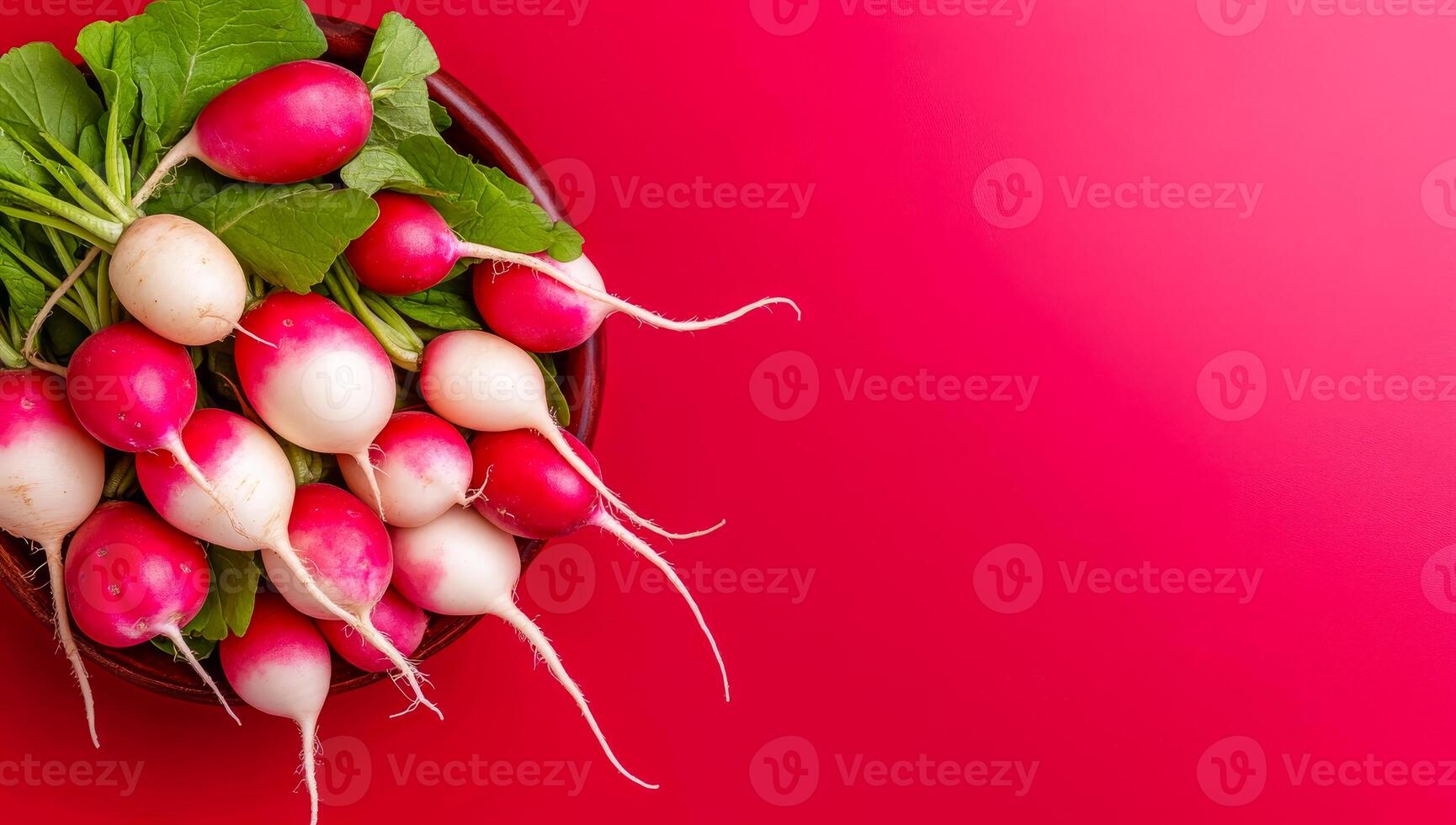 Bowl of fresh radishes. A vibrant bowl filled with fresh radishes showcasing their bright colors and crisp greens, perfect for salads. photo