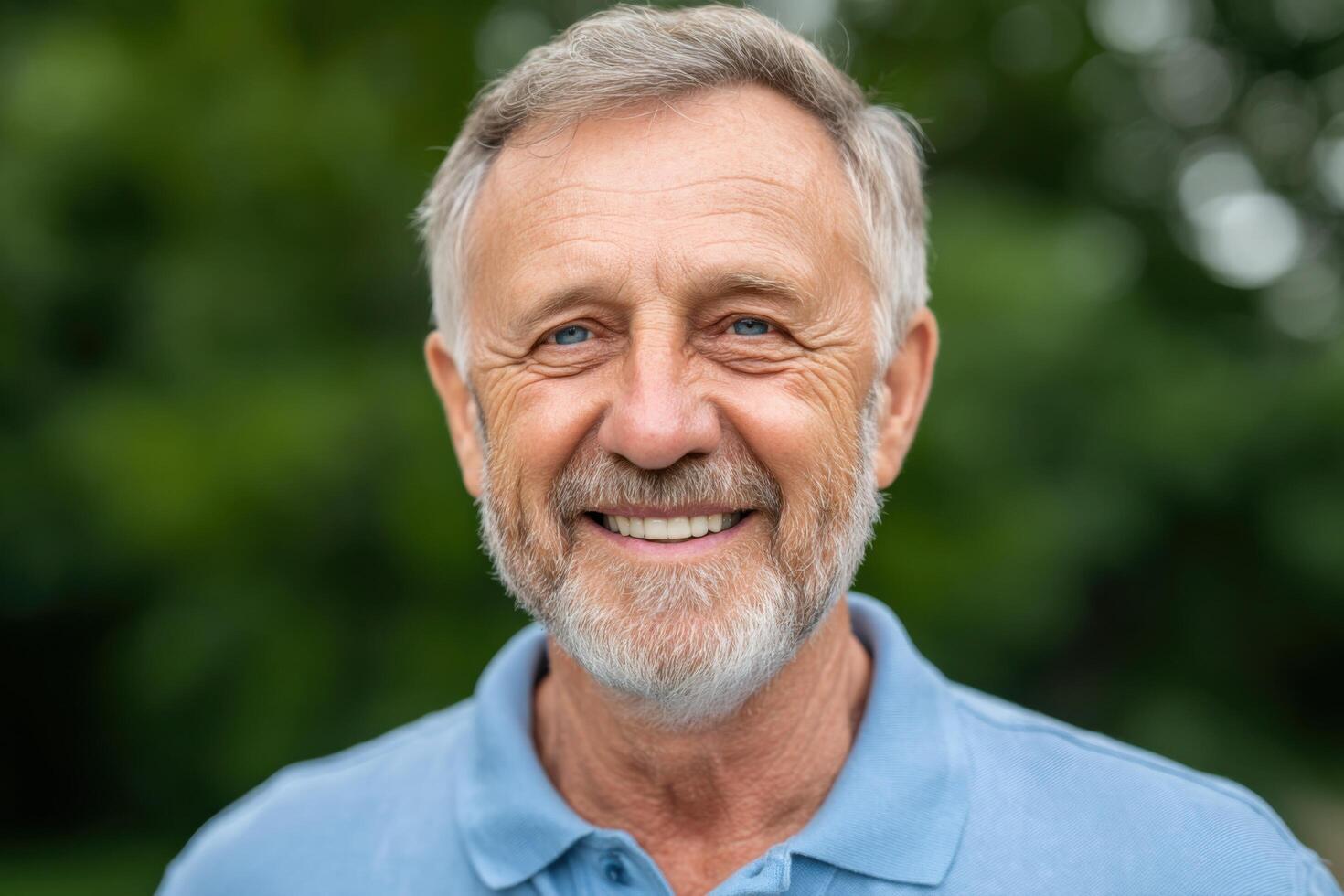Portrait of a cheerful senior man smiling contentedly. A joyful expression of happiness and well being, radiating positive emotion photo