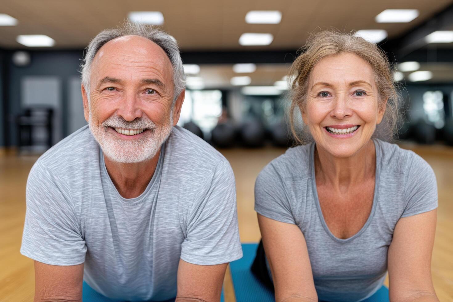 Active Senior Couple Smiling After Fitness Workout at the Gym. Healthy Lifestyle, Wellness, and Active Aging Concept photo