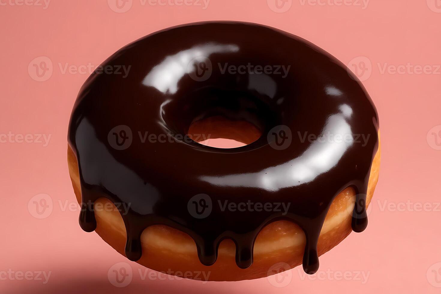 A chocolate glazed donut is floating in the air photo