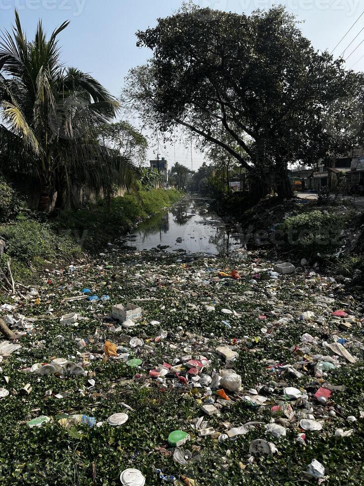 river has become dead due to garbage dumping. photo